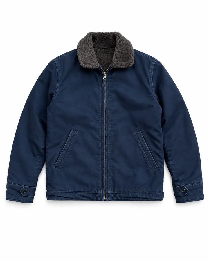 A navy deck jacket, cut out on a studio backdrop